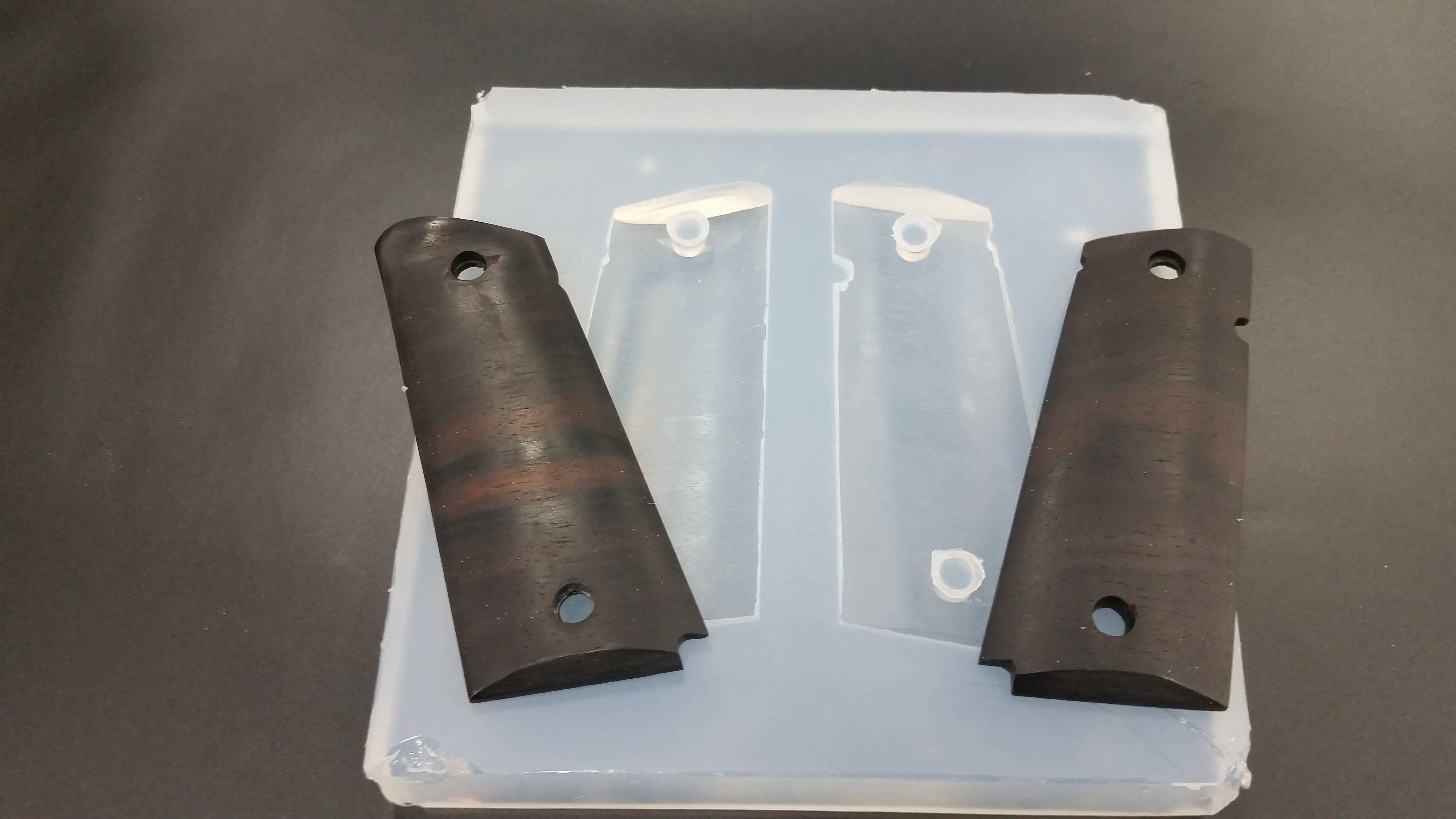 Hand made pistol grips by Jake Rosek at