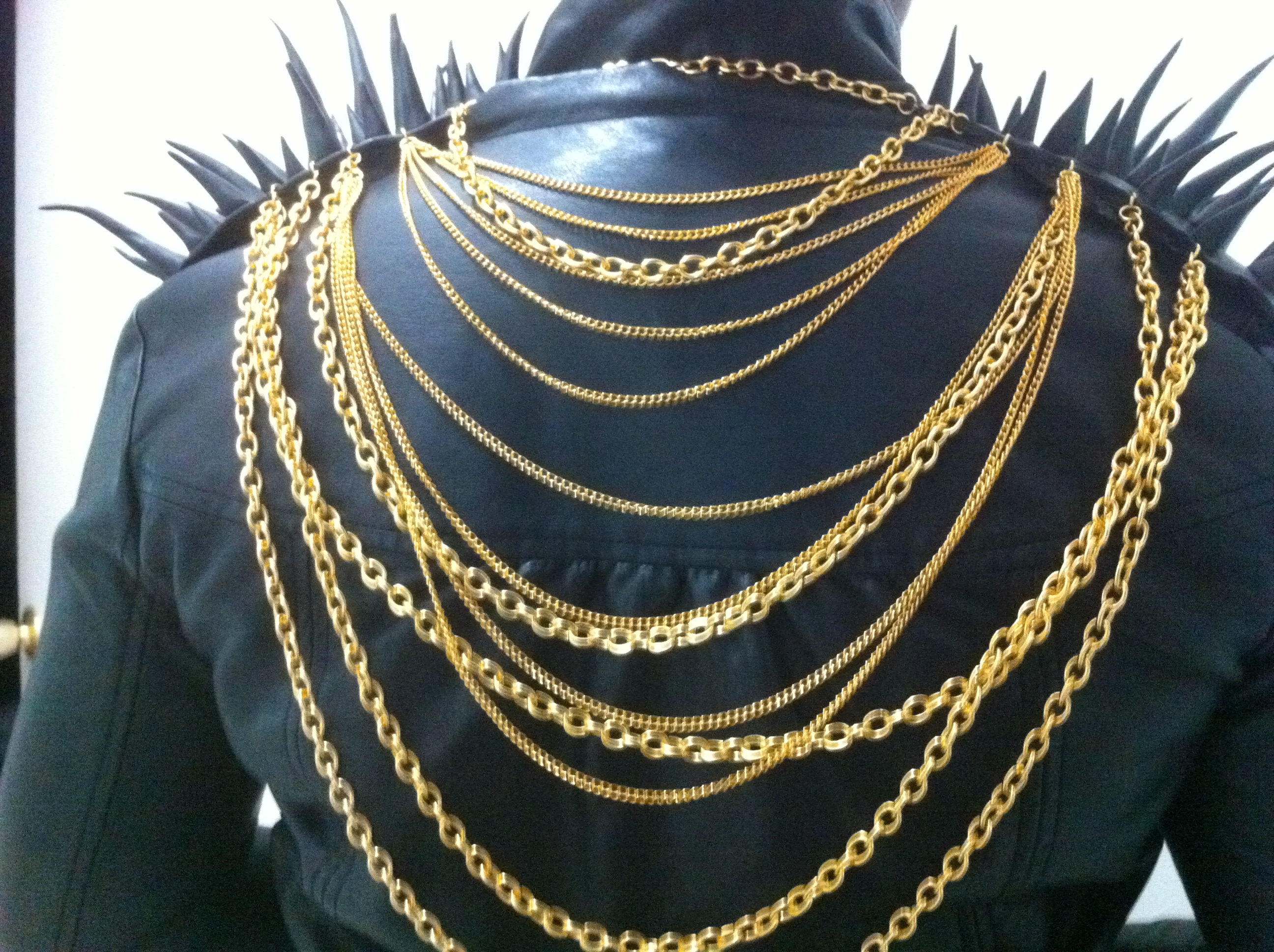 Spiked shoulder pad accessory by Melissa Loftman at