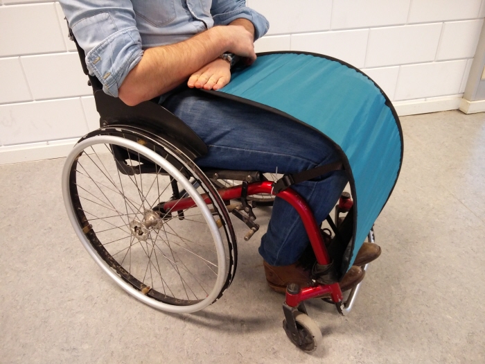 Design of a Lightweight, Foldable Rain Protection for Wheelchair Users