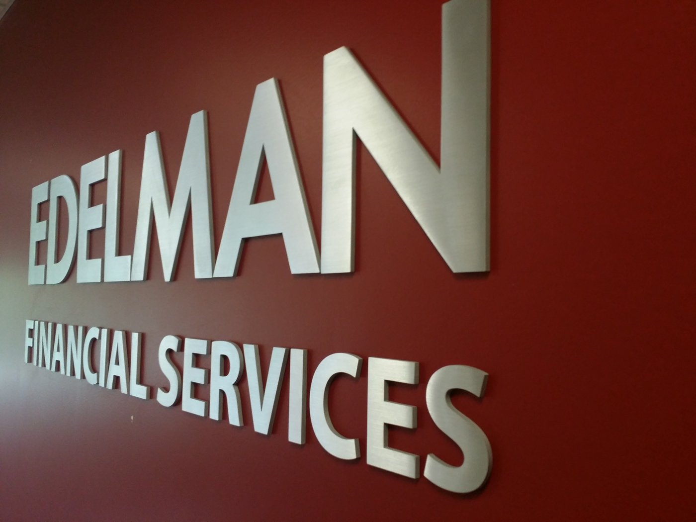 Edelman - brushed metal letters by Max Lavelle at Coroflot.com