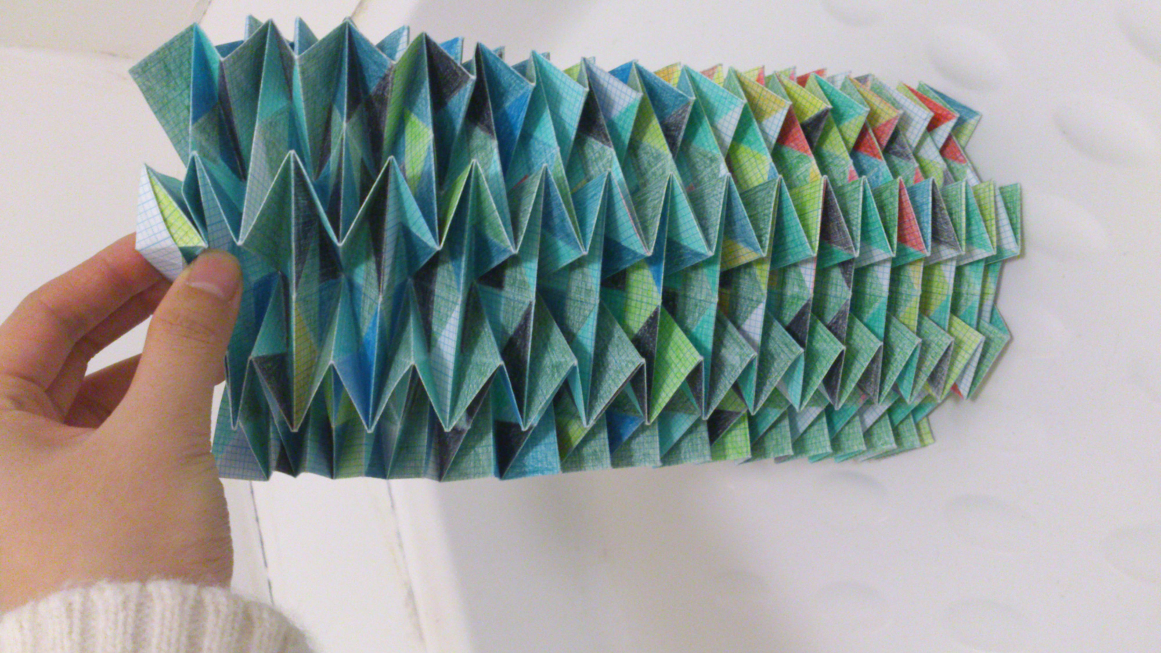 Triangle origami by Jingjing Ma at