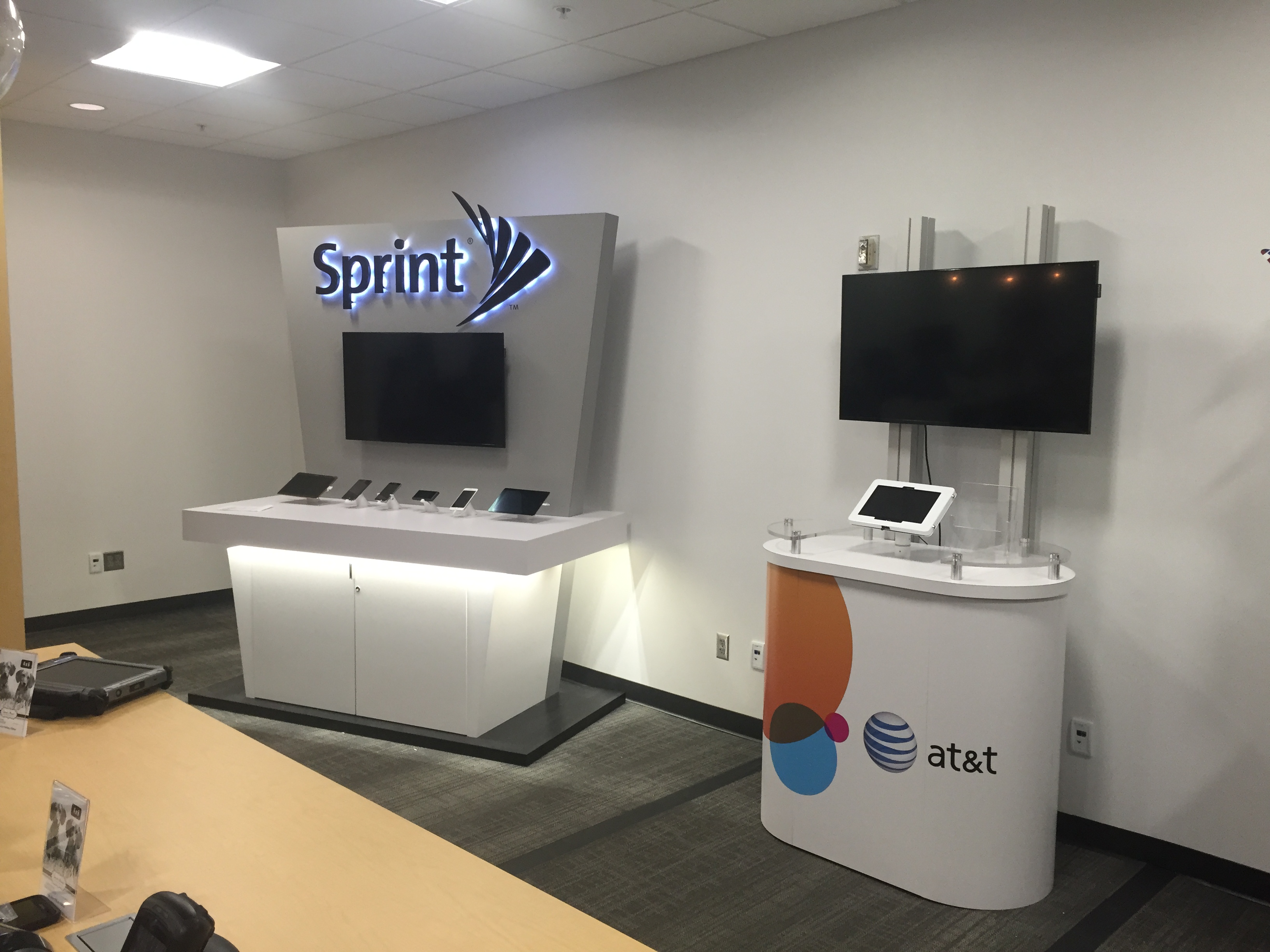 Sprint Kiosk in American Airlines HQ by Jamie Hall at
